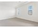 Bright and airy bedroom featuring neutral carpet, tray ceiling, and natural light at 1 Easy St # 4, Carefree, AZ 85377