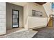 Welcoming entryway showcasing a modern door, clean lines, and elegant stonework for a sophisticated appeal at 1 Easy St # 4, Carefree, AZ 85377