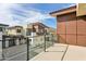 Balcony view showcasing neighborhood townhomes with multi-tone exteriors under a partly cloudy sky at 1 Easy St # 4, Carefree, AZ 85377