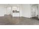 Open-concept space highlighting sleek tile floors and a modern, well-equipped kitchen area for entertaining at 1 Easy St # 4, Carefree, AZ 85377