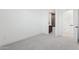The bedroom leads into a connected bathroom and features neutral carpeting at 1 Easy St # 5, Carefree, AZ 85377
