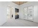 Stylish bedroom featuring a wood ceiling, wet bar, and adjacent room with a modern metal handrail at 1 Easy St # 5, Carefree, AZ 85377