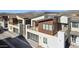 Modern two-story home with a sleek design, garage and balcony, showcasing contemporary architectural details at 1 Easy St # 5, Carefree, AZ 85377