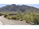 An exterior shot of a modern home with the mountain in the background at 1 Easy St # 5, Carefree, AZ 85377