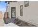 Inviting front entrance with a modern door, clean lines, xeriscape yard, and a well-maintained pathway at 1 Easy St # 5, Carefree, AZ 85377