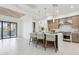 Stylish kitchen featuring a quartz island, modern appliances, pendant lights, and an open layout design at 1 Easy St # 5, Carefree, AZ 85377