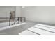 Spacious loft with modern railing, abundant natural light, and sleek, minimalist design at 1 Easy St # 5, Carefree, AZ 85377