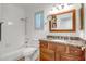 Clean bathroom with a tiled shower and granite vanity at 10101 N Arabian Trl # 1005, Scottsdale, AZ 85258