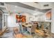 Bright and airy dining room area with vaulted ceilings and modern decorations at 10101 N Arabian Trl # 1005, Scottsdale, AZ 85258