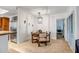 Cozy dining room with seating for four and easy access to the kitchen and a separate office space at 10101 N Arabian Trl # 1005, Scottsdale, AZ 85258