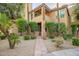 Exterior view showcasing the home's landscaping and private entrance at 10101 N Arabian Trl # 1005, Scottsdale, AZ 85258