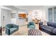 Charming living room connecting dining and kitchen with comfortable seating and stylish décor at 10101 N Arabian Trl # 1005, Scottsdale, AZ 85258