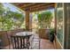 Covered patio with tile flooring and furniture, perfect for outdoor relaxation at 10101 N Arabian Trl # 1005, Scottsdale, AZ 85258