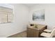 Bright home office with natural light and neutral decor at 10610 W Bloch Rd, Tolleson, AZ 85353
