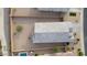 Aerial perspective of a gravel backyard, showing the roof and fence lines at 1127 E Tyler Ln, Casa Grande, AZ 85122