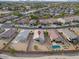 Aerial view of a gravel backyard with a pool in a community setting at 1127 E Tyler Ln, Casa Grande, AZ 85122