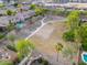 Bird's eye view of lush community park with volleyball court and walking trails at 1127 E Tyler Ln, Casa Grande, AZ 85122