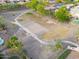 Enjoy the community park with walking paths, volleyball court and green common area at 1127 E Tyler Ln, Casa Grande, AZ 85122
