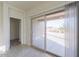 Bright dining area with sliding glass doors to a patio and backyard space, allowing for seamless indoor-outdoor living at 1127 E Tyler Ln, Casa Grande, AZ 85122