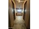 Luxury primary bath features a soaking tub, neutral color scheme, and decorative lighting at 12937 W Calle De Sol --, Peoria, AZ 85383