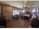Spacious bedroom featuring a ceiling fan and wood-look floors at 12937 W Calle De Sol --, Peoria, AZ 85383