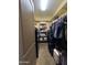 Walk-in closet featuring custom shelving and ample storage space at 12937 W Calle De Sol --, Peoria, AZ 85383