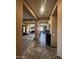 Spacious hallway featuring tile flooring and views of other rooms in the home at 12937 W Calle De Sol --, Peoria, AZ 85383