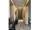 Hallway with decorative furniture, neutral paint color scheme, and tile flooring at 12937 W Calle De Sol --, Peoria, AZ 85383