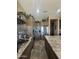 Modern kitchen featuring stainless steel appliances, granite countertops and wood cabinets at 12937 W Calle De Sol --, Peoria, AZ 85383