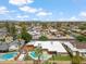Overhead view highlighting the backyard pool and surrounding residential neighborhood at 1308 S Spur --, Mesa, AZ 85204