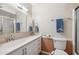 Bathroom featuring a vanity, toilet, shower with glass doors, and modern fixtures at 1308 S Spur --, Mesa, AZ 85204