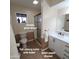 Well-appointed bathroom with a shower, toilet, and vanity, creating a complete and stylish retreat at 1308 S Spur --, Mesa, AZ 85204