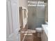 Bathroom with privacy glass shower doors and oblong toilet with bidet at 1308 S Spur --, Mesa, AZ 85204