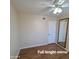 Bedroom 3 featuring a ceiling fan and full-length mirror at 1308 S Spur --, Mesa, AZ 85204