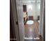 Primary suite entrance featuring wood-look vinyl flooring at 1308 S Spur --, Mesa, AZ 85204