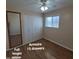 Bedroom 3 featuring a full-length mirror and Armoire with 15 drawers at 1308 S Spur --, Mesa, AZ 85204