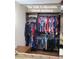 Walk-in closet with adjustable shelves and hanging rods for clothing at 1308 S Spur --, Mesa, AZ 85204