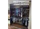 Organized closet offers shelving and hanging space for clothing and accessories at 1308 S Spur --, Mesa, AZ 85204