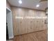 East wall of the dining/kitchen featuring ample cabinet and drawer space, perfect for storage at 1308 S Spur --, Mesa, AZ 85204