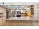 Modern kitchen with stainless steel appliances, ample cabinetry, and bright lighting, perfect for cooking and entertaining at 1308 S Spur --, Mesa, AZ 85204