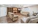 Relax in this living room by the fireplace with built in shelves and entertainment center at 1308 S Spur --, Mesa, AZ 85204