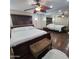 Spacious main bedroom with ceiling fan, wood flooring, and mirrored closet doors at 1308 S Spur --, Mesa, AZ 85204