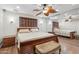 Main bedroom featuring hardwood floors, a fan, and natural light at 1308 S Spur --, Mesa, AZ 85204