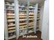 A large view of the kitchen pantry with 24 pullouts, ensuring storage is well-organized and accessible at 1308 S Spur --, Mesa, AZ 85204
