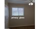 Bedroom 3 with privacy glass and a ceiling fan at 1308 S Spur --, Mesa, AZ 85204