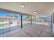 Covered back patio offering views of the sparkling pool and fenced-in yard at 1444 W Wickieup Ln, Phoenix, AZ 85027