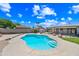 Refreshing in-ground pool with desert landscaping and privacy fencing at 1444 W Wickieup Ln, Phoenix, AZ 85027