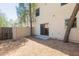 Private backyard with sliding glass door entrance at 15818 N 25Th St # 124, Phoenix, AZ 85032