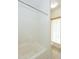 Bright bathroom featuring a tiled shower-tub and a window at 15818 N 25Th St # 124, Phoenix, AZ 85032