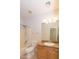 Bright bathroom featuring tub with tiled shower and granite vanity at 15818 N 25Th St # 124, Phoenix, AZ 85032